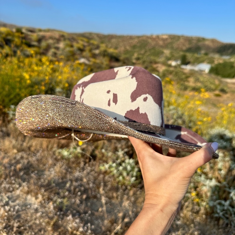 - Cow print rhinestone cowboy hat